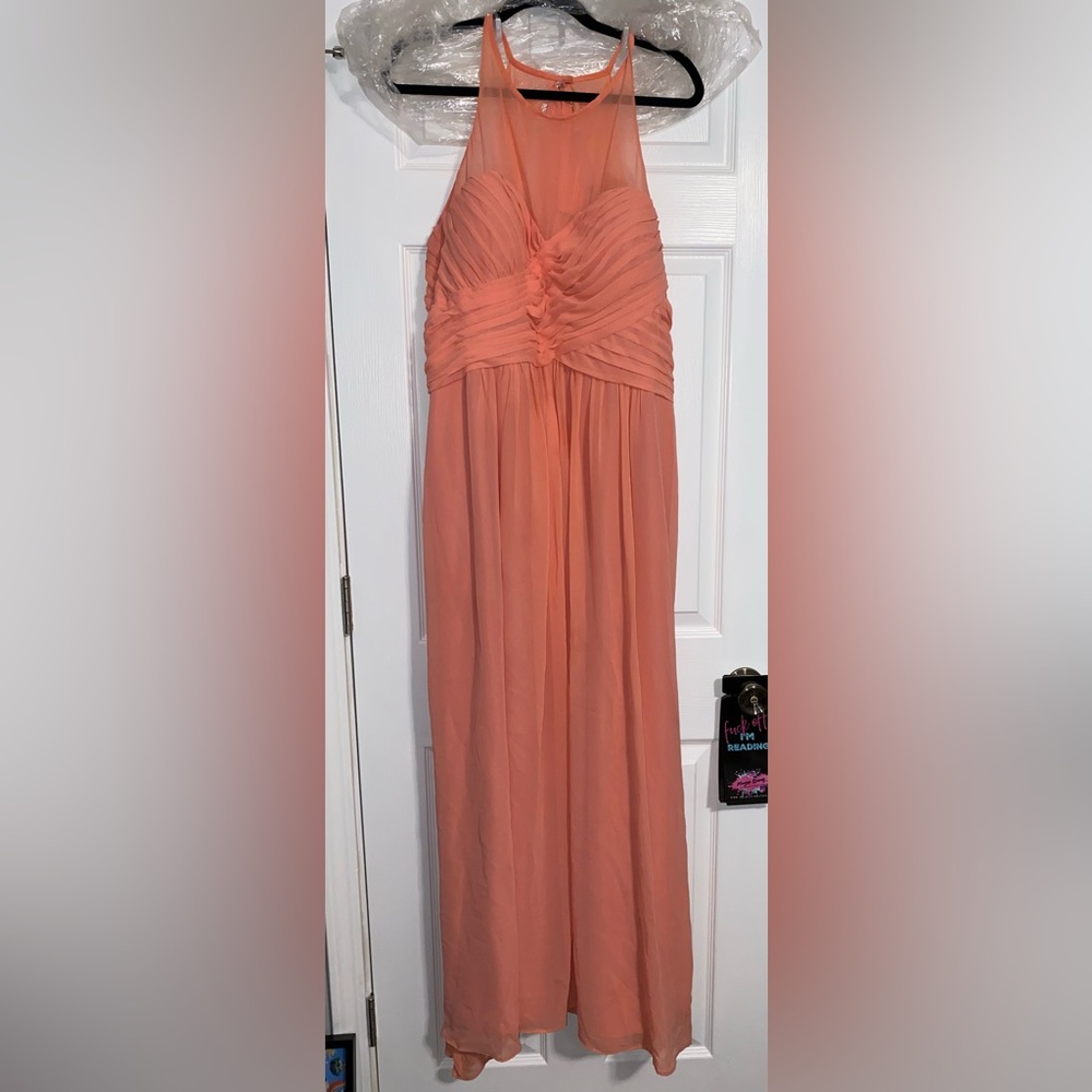 Kanali K brides made dress in a peachy coral